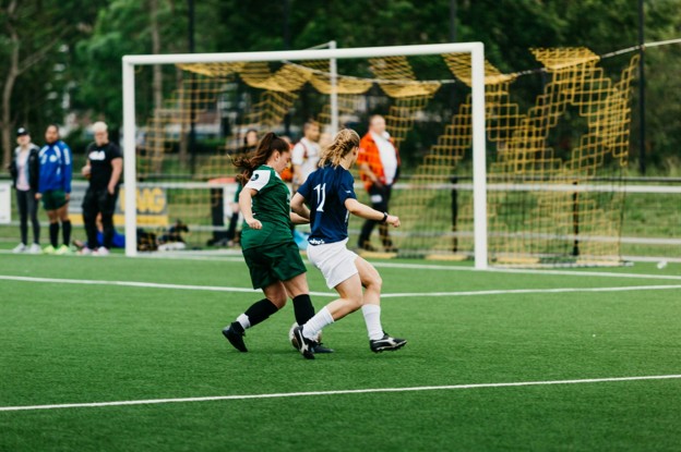 girls play soccer 