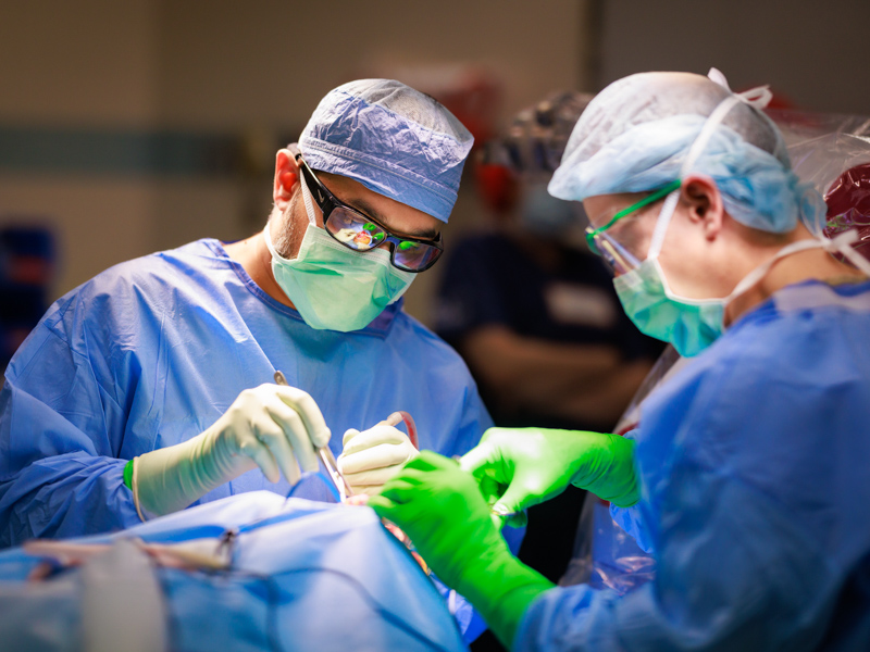Specialized care is on display as Dr. Omar Chohan, associate professor of neurosurgery, implants a neurostimulator device in patient James Canfield in 2025.