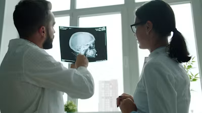 doctor looking at brain xray