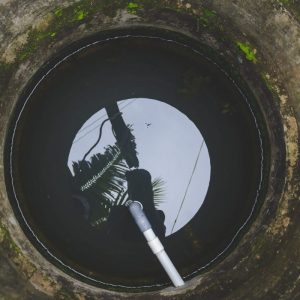 close up of inside of well with water