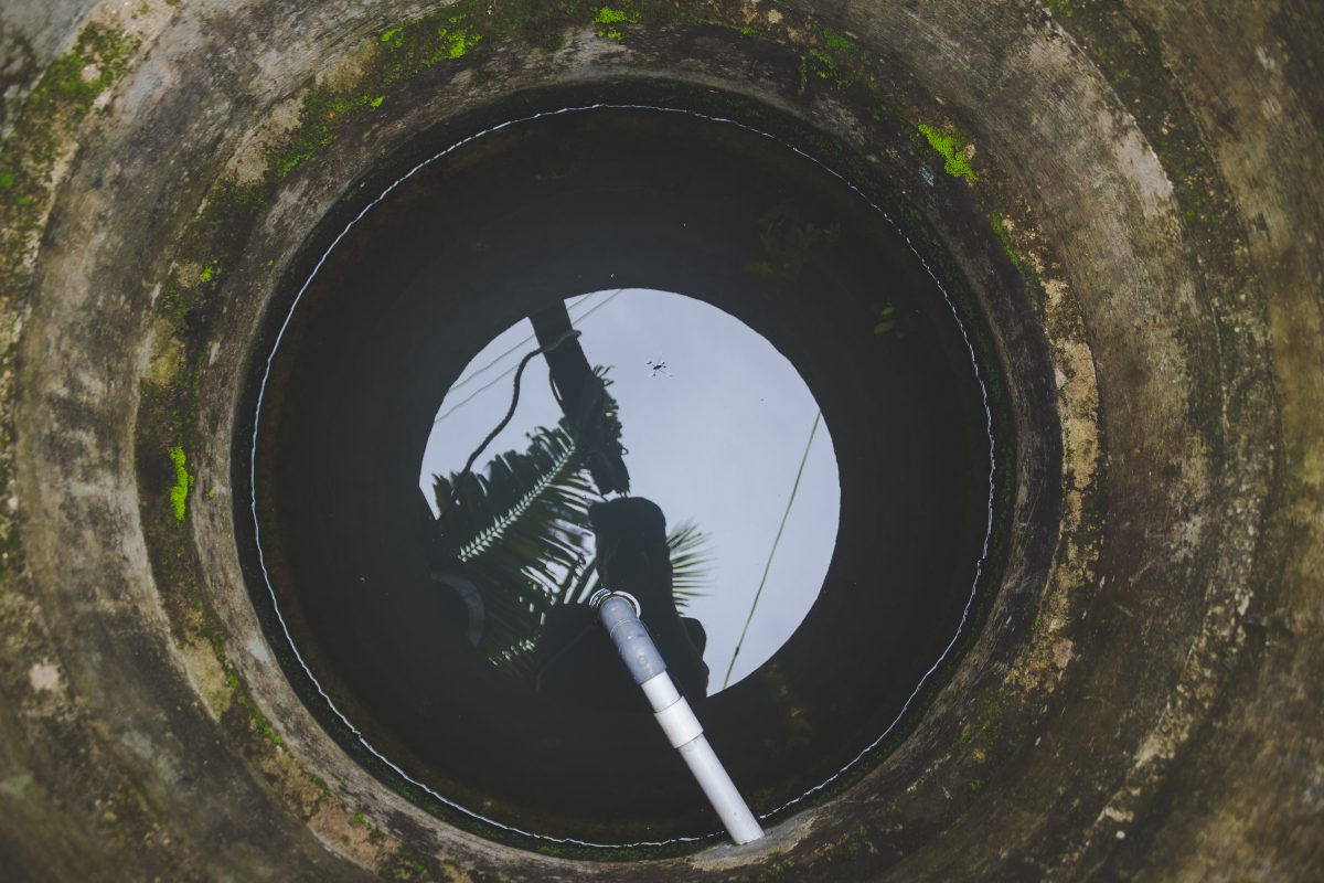 close up of inside of well with water