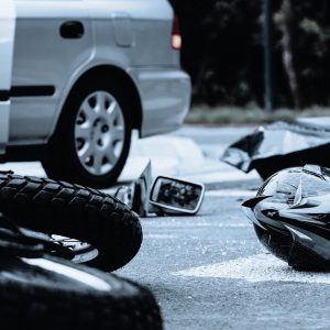 motorcylce wreck with white car