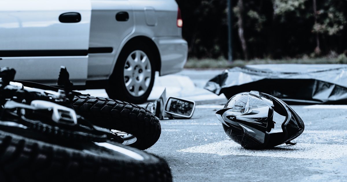 motorcylce wreck with white car