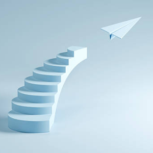paper airplane and stairs