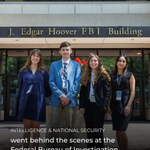 Caleb Jones with other students in front of the J. Edgar Hoover FBI Building
