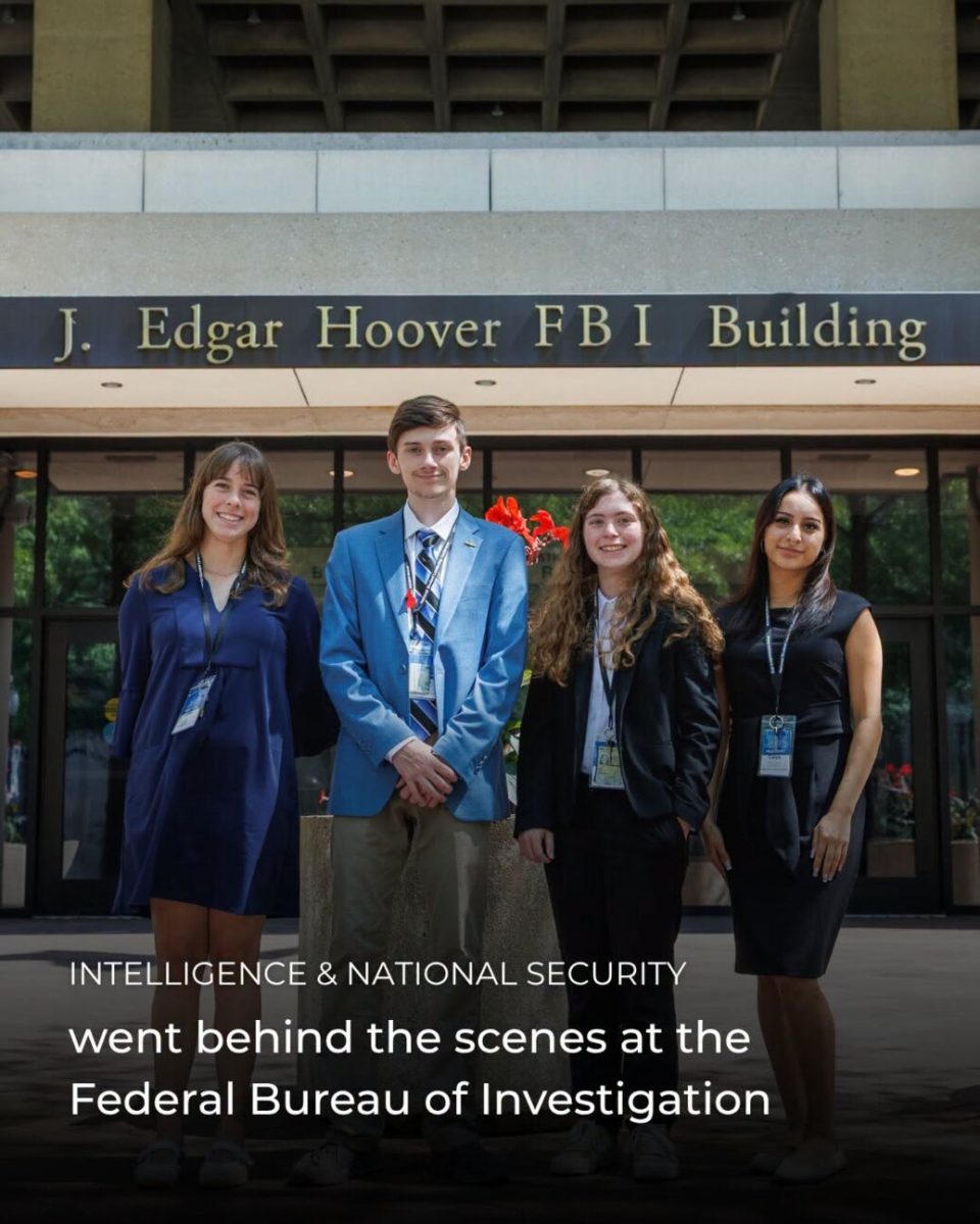 Caleb Jones with other students in front of the J. Edgar Hoover FBI Building