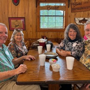 Clinton High School alumni seated at long tables during the Fall CHS Alumni Quarterly Luncheon