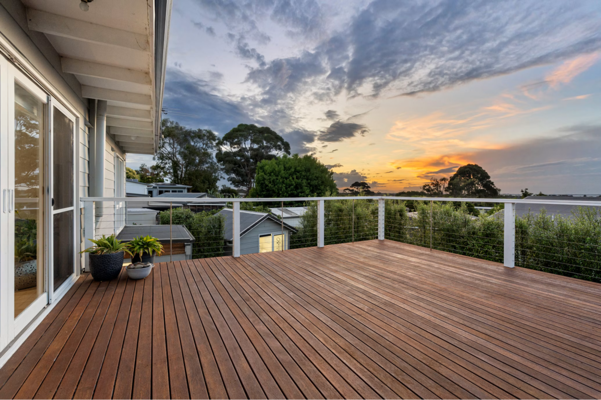 picture of a sunset on a porch deck