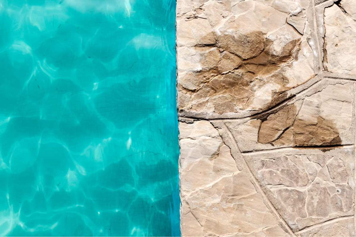 close up of side of pool with water