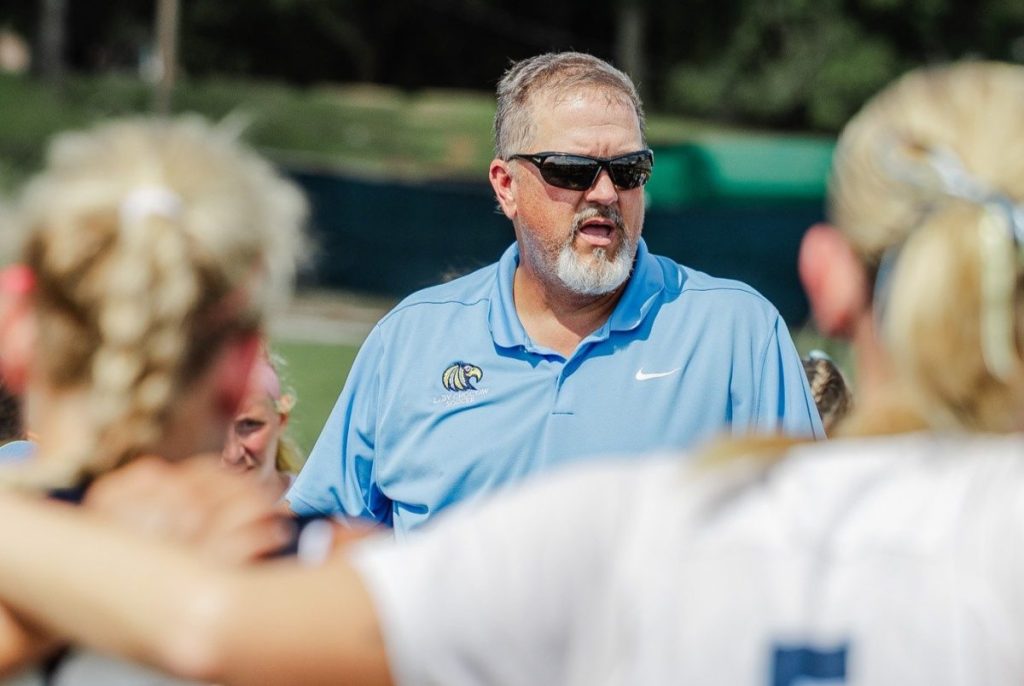 Coach Darryl Longabaugh speaks to the Lady Choctaws soccer team against Emmanuel University on Aug. 27 at Robinson-Hale Stadium