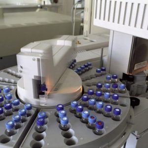 Rows of sample vials loaded in a laboratory chromatography instrument courtesy of Yuri Shkoda on Pexels