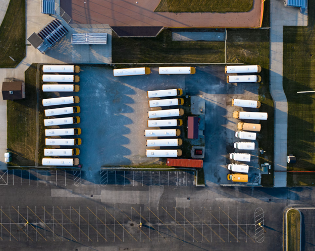 sky view of trucks in a parking lot