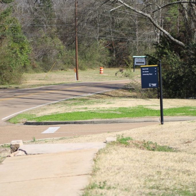 Photos from early 2025 show the areas that have been approved for a sidewalk build along the south side of College Street from Mt. Salus Drive to where the existing sidewalk ends just east of the Mississippi College Arts Complex.