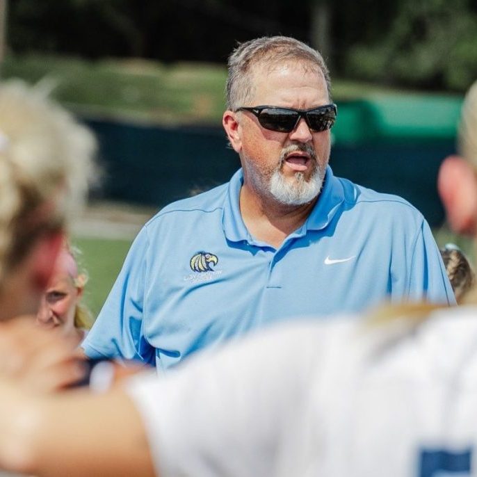 Coach Darryl Longabaugh speaks to the Lady Choctaws soccer team against Emmanuel University on Aug. 27 at Robinson-Hale Stadium