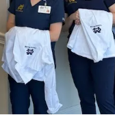 The white coats are emblematic of School of Nursing students who are eligible to celebrate their entrance into patient care.